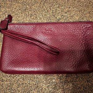 Coach oxblood color double wristlet wallet